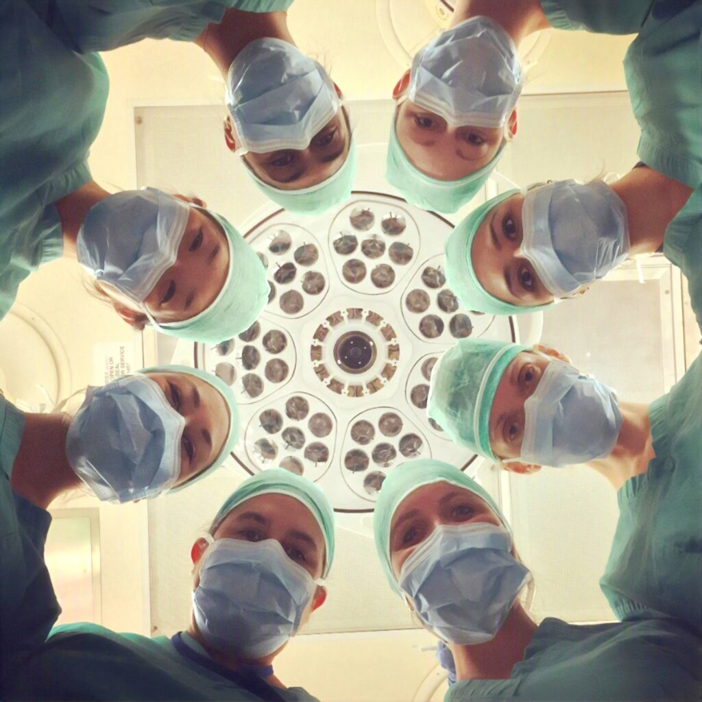 ophthalmologists looking down a camera